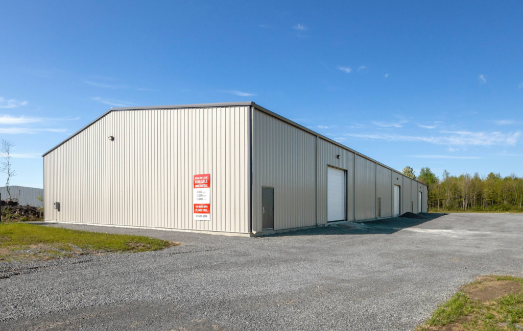 three bay, pre-engineered metal buildings built by an investor in a rural area of East Texas