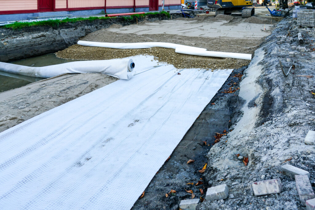 geotextile road fabric is critical for metal building site preparation